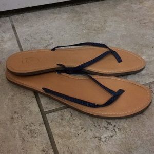 Blue snake skin print flip flops
